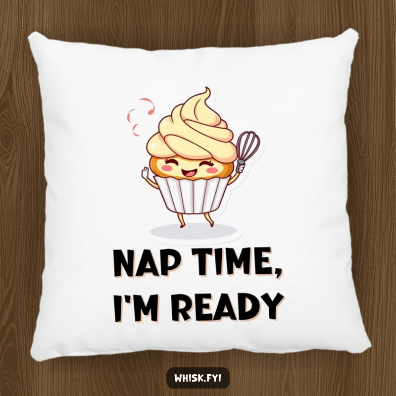 Funny pillow featuring a smiling cupcake character playfully twirling a whisk, offering comfort and sweet baking-themed amusement.