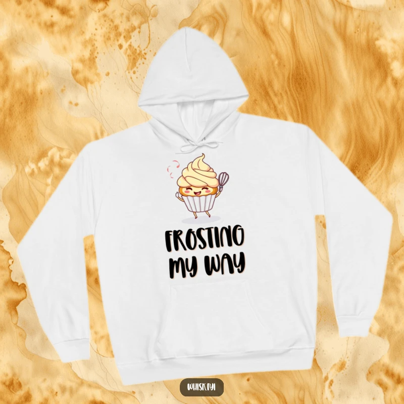 Funny hoodie featuring a smiling cupcake character playfully twirling a whisk, offering cozy warmth and sweet baking humor.