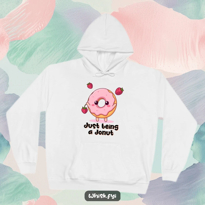 Funny hoodie featuring a playful donut character tossing a berry, radiating pure, sweet joy.