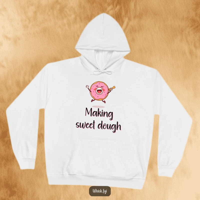 Funny hoodie featuring a joyful donut character jumping with a rolling pin, ideal for cozy baking sessions.