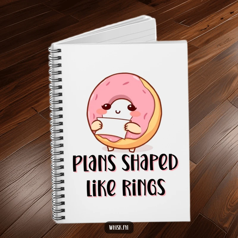 Funny donut character carefully folding parchment paper, depicted on the cover of a notebook for recipe keeping.