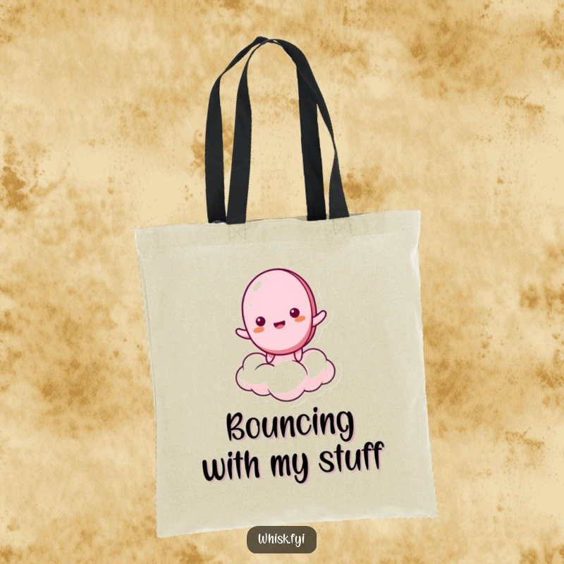 Funny tote bag with a giddy macaron character bouncing on a cloud, perfect for carrying items with a playful and humorous touch.
